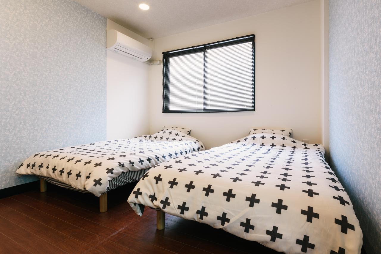 Guest House Yasuragi Hakataekimae ฟูกุโอกะ ภายนอก รูปภาพ